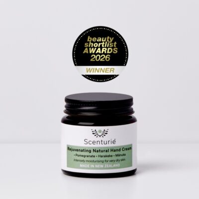 Scenturie Rejuvenating Natural Hand Cream in amber glass jar with 2026 International Beauty Shortlist Double Gold Winner logo. NZ made intensive repair for dry, mature hands.