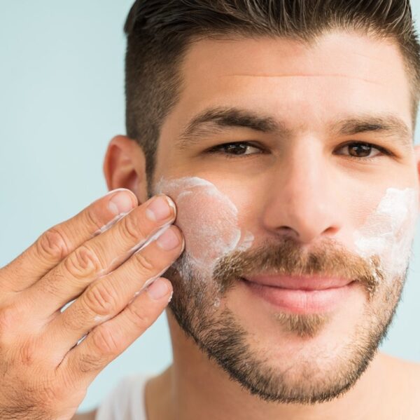 Man applying Scenturie Men's Cleanser