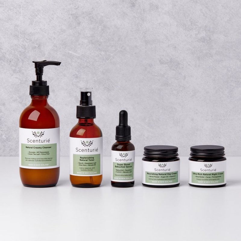 Scenturie Ultra-Hydrating Skincare Set featuring botanical cleanser, toner, serum, day cream, and night cream. Sustainable amber glass bottles. Expertly formulated by health science professional Tania Cibulskis to replenish the skin’s barrier using high-performance, plant-based ingredients handcrafted in New Zealand