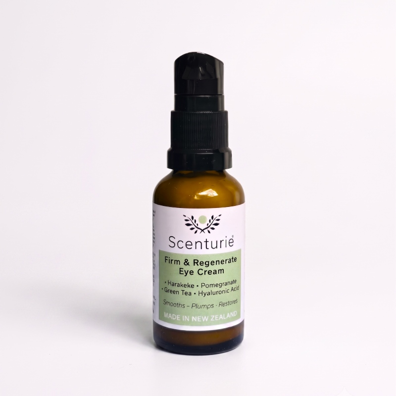 Close-up of Scenturie Firm & Regenerate Natural Eye Cream in an amber glass jar, a pro-ageing eye treatment designed to firm and plump the eye contour.