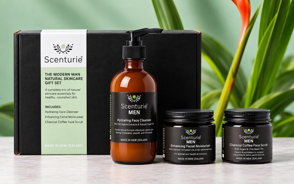 Scenturie Modern Man Natural Skincare Gift Set featuring the full-sized award-winning Men's Cleanser, Scrub, and Moisturiser in front of a premium black gift box with a Bird of Paradise plant in the background.