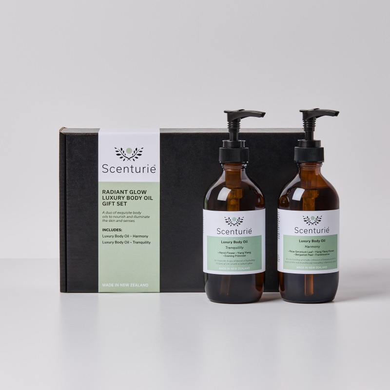 Scenturie Radiant Glow Gift Set: Two 195mL aromatherapy body and massage oils in Harmony and Tranquility scents.