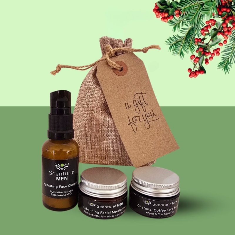 Scenturie Men's Skincare Travel Set, featuring Cleanser, Scrub, and Moisturiser, presented on a festive Christmas background.