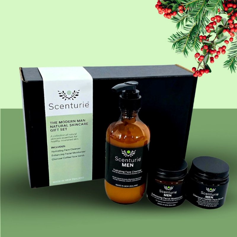 The Scenturie Modern Man Skincare Gift Set, featuring the cleanser, scrub, and moisturiser, styled on a festive background with mistletoe.