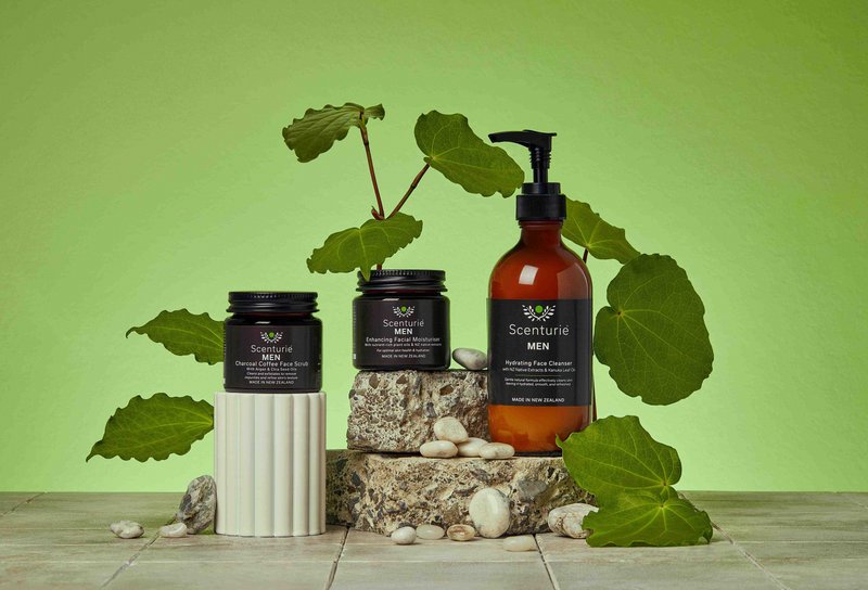 Scenturie Men's Skincare range: award-winning charcoal scrub, moisturizer, and cleanser with NZ native Kawakawa leaves.