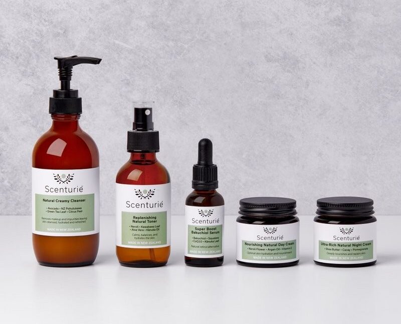 Scenturie Ultra-Hydrating Skincare Set featuring botanical cleanser, toner, serum, day cream, and night cream. Sustainable amber glass bottles. Expertly formulated by health science professional Tania Cibulskis to replenish the skin’s barrier using high-performance, plant-based ingredients handcrafted in New Zealand.